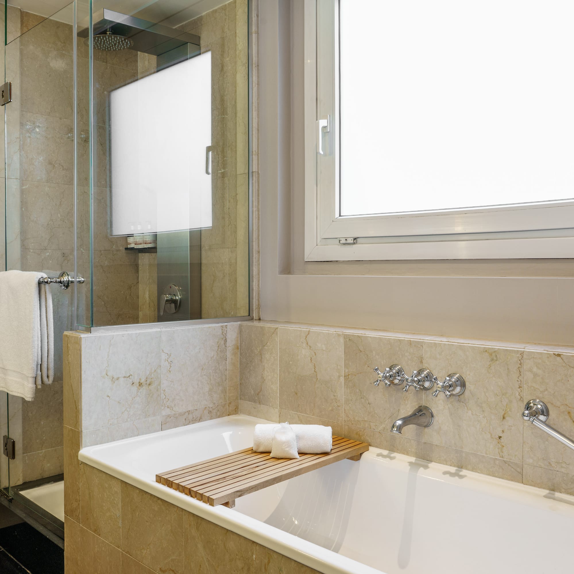 a bathtub and shower in a bathroom
