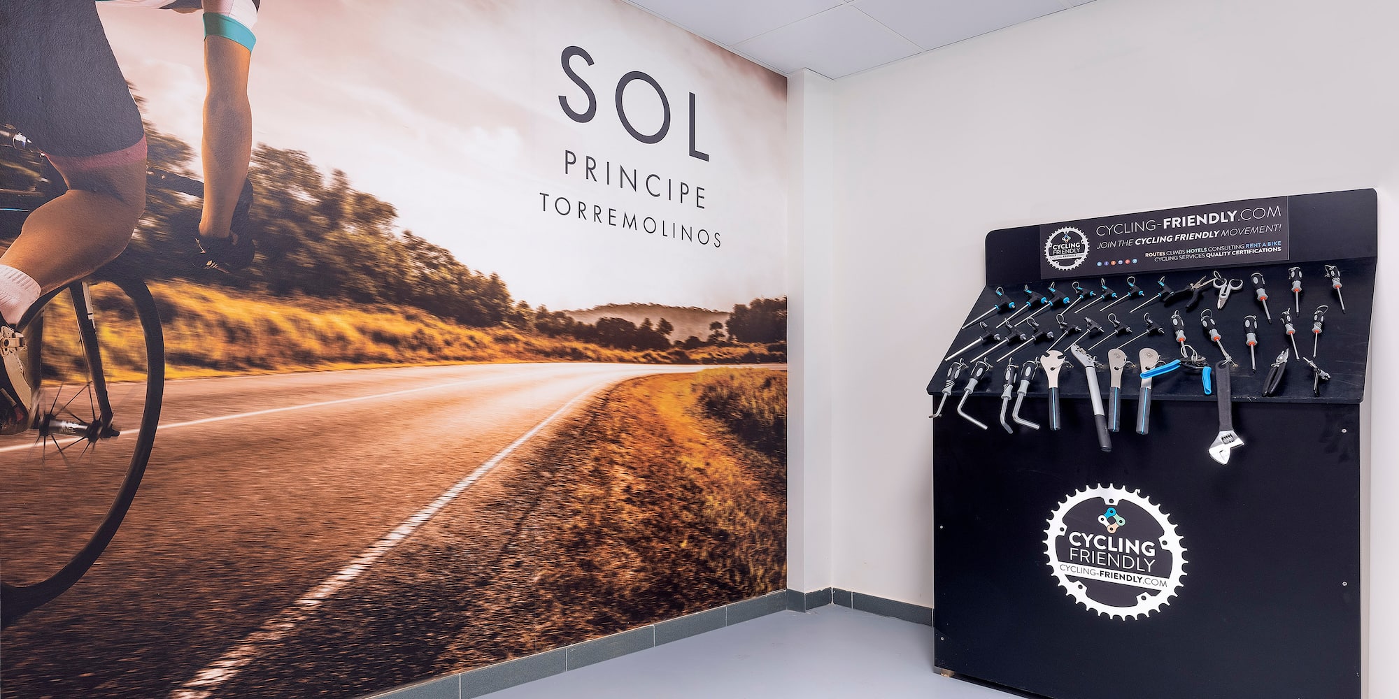 a bicycle rack with swingers and a picture of a road