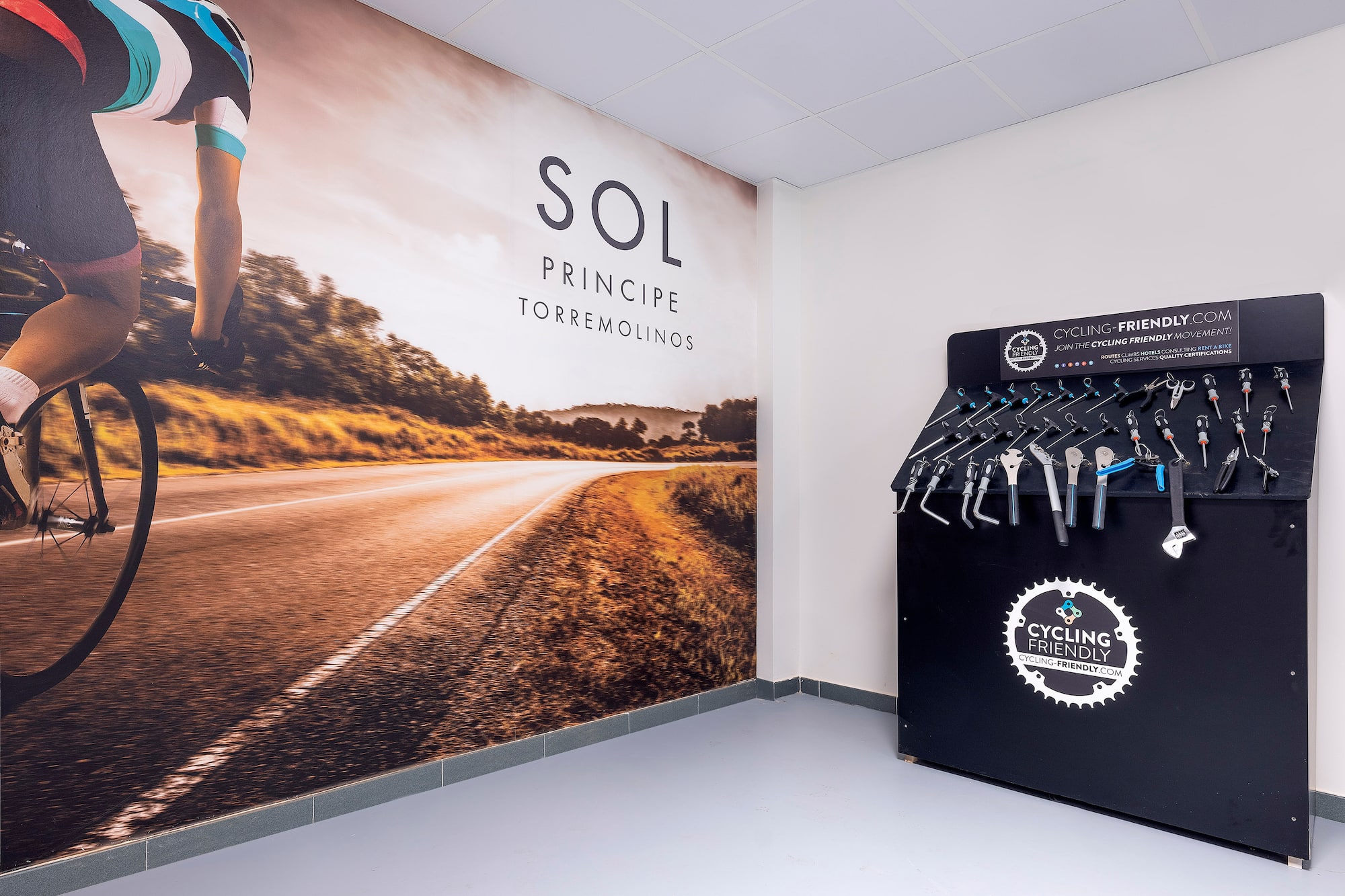 a bicycle rack with swingers and a picture of a road