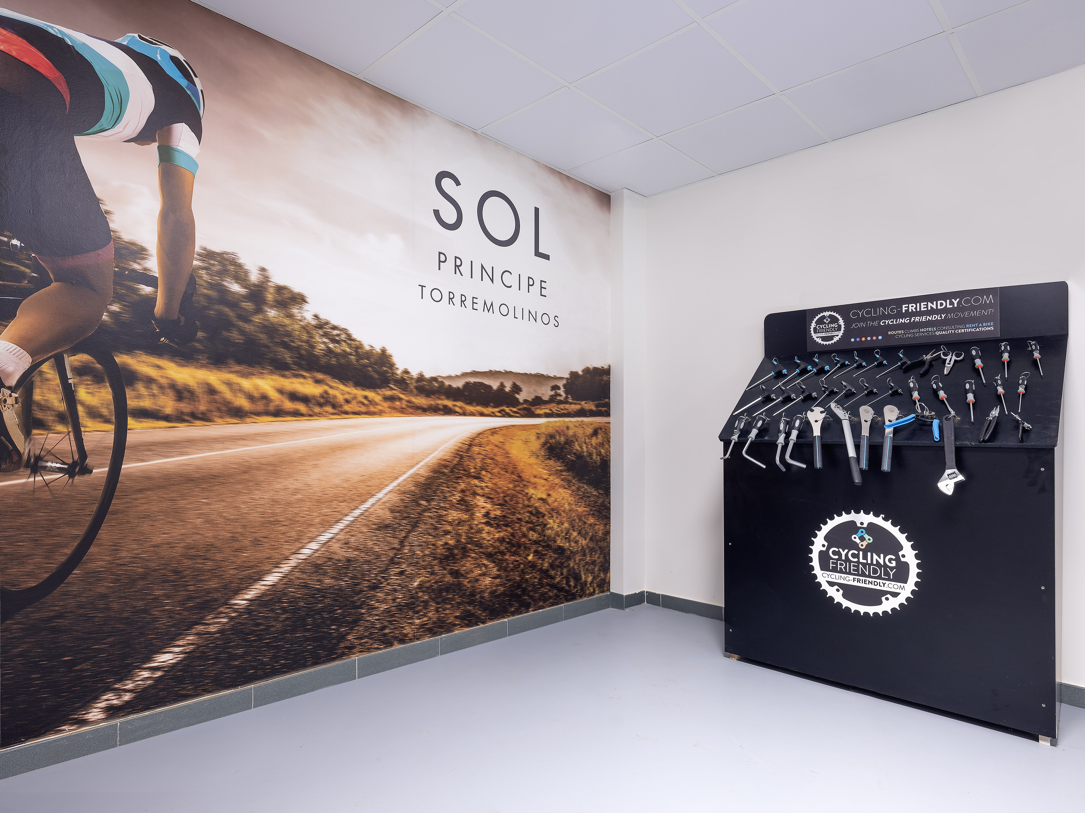 a bicycle rack with swingers and a picture of a road