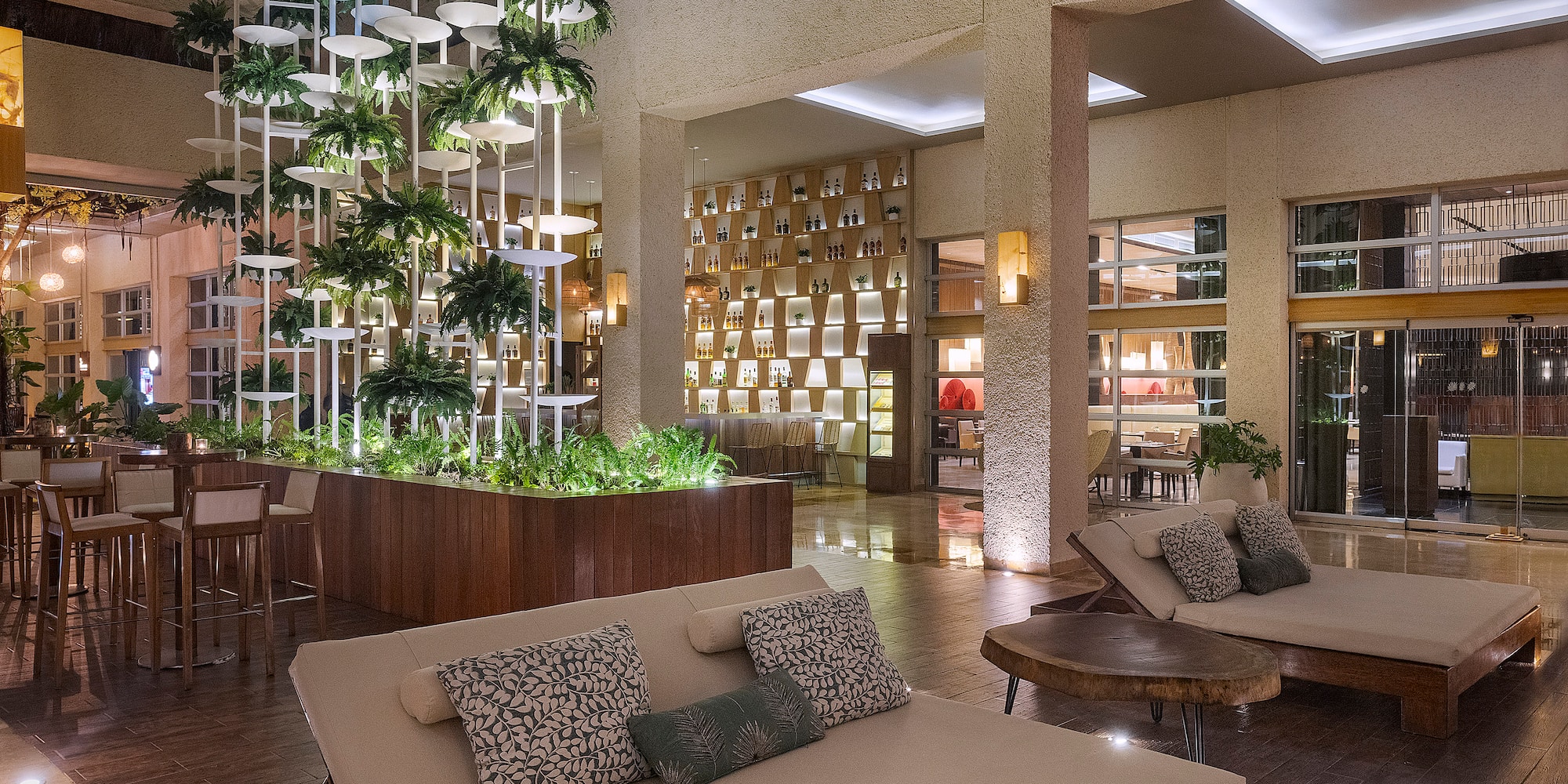 a room with a couch and chairs