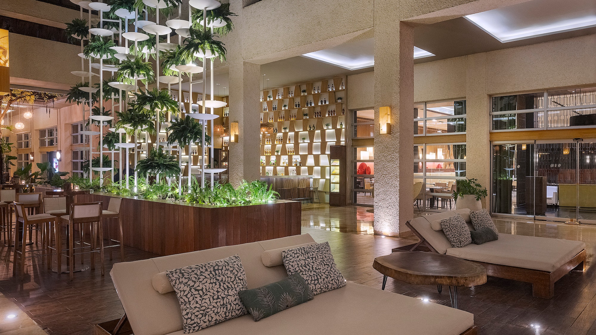 a room with a couch and chairs