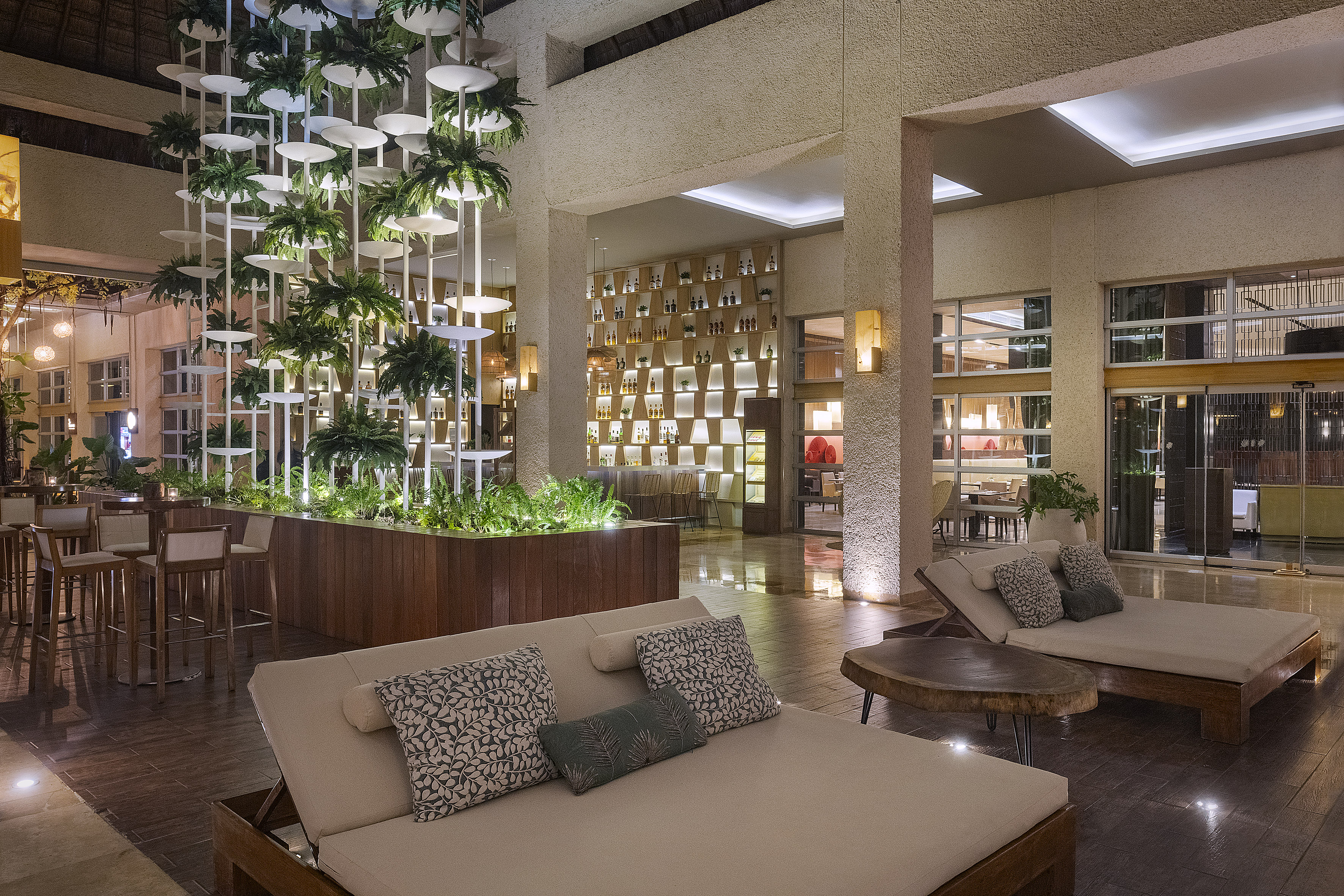 a room with a couch and chairs