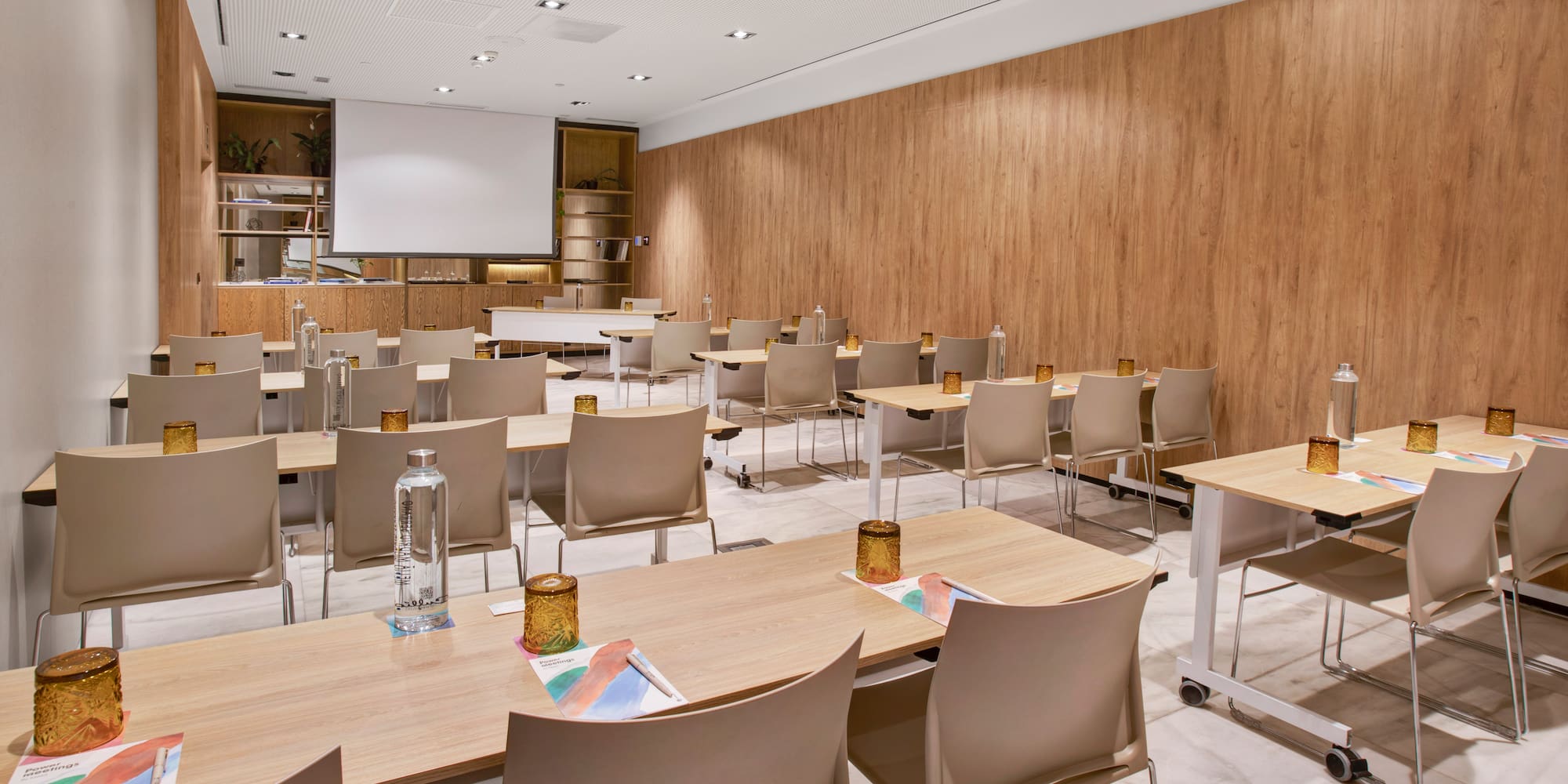 a room with tables and chairs