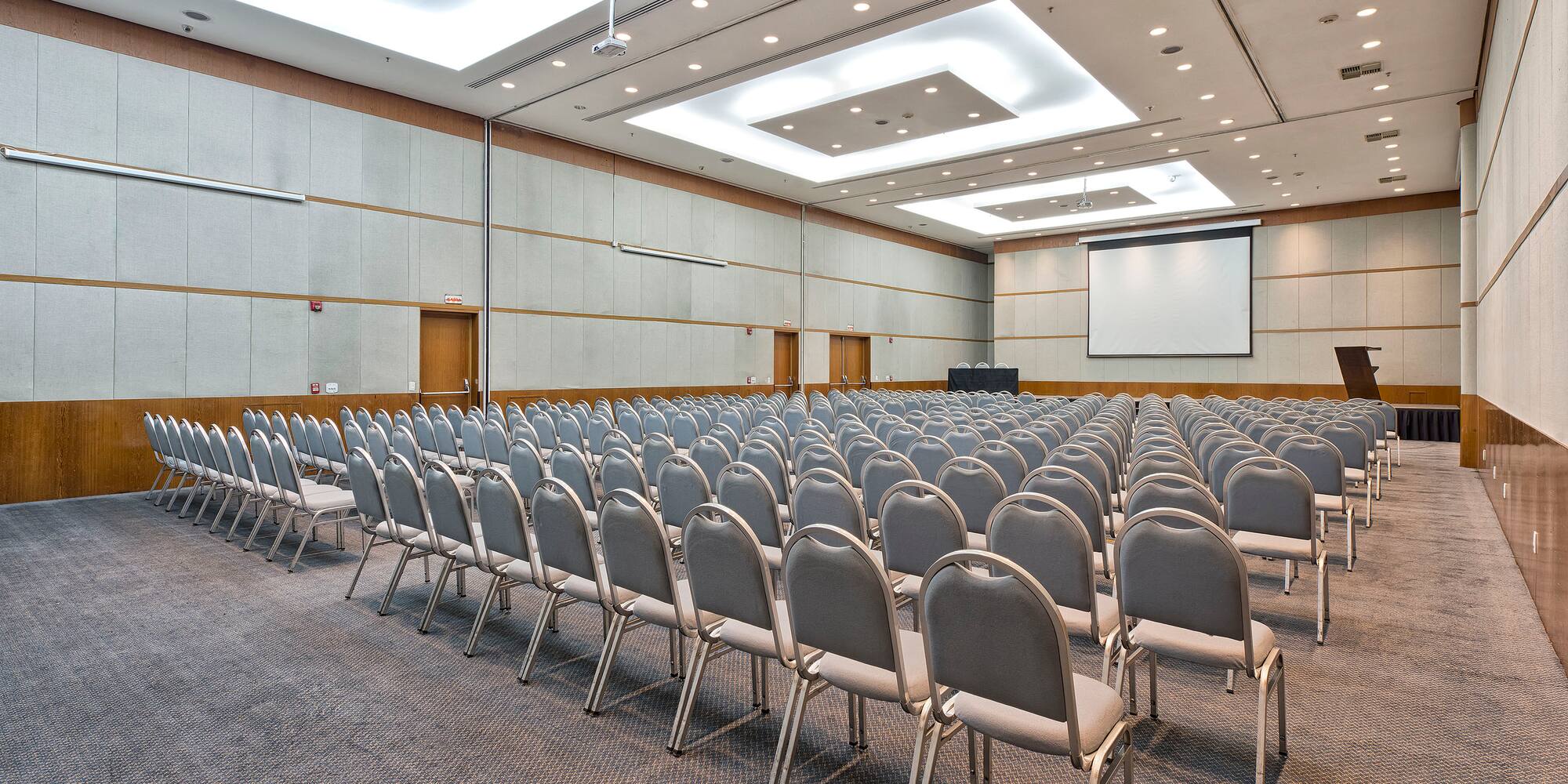 a large room with rows of chairs