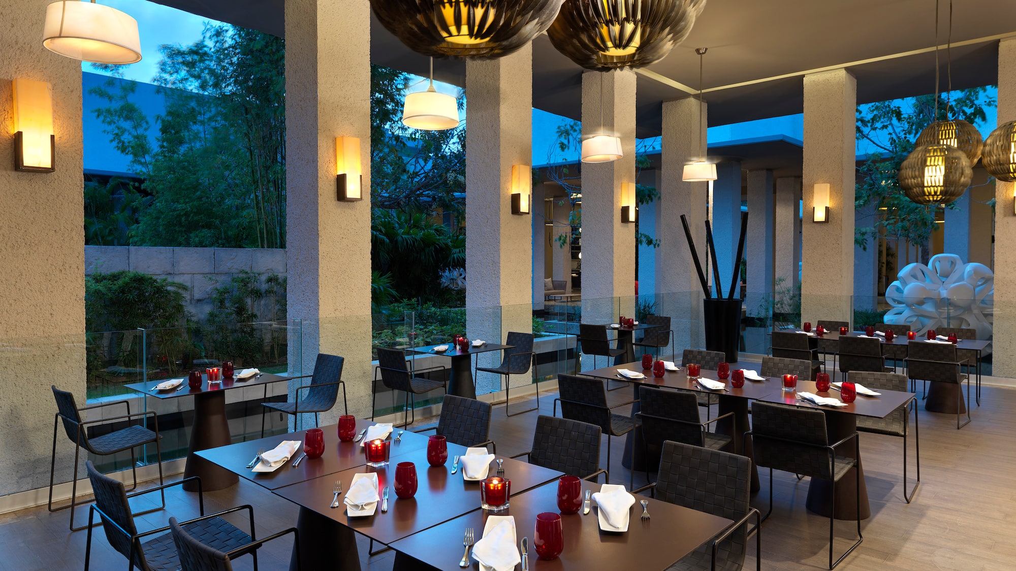 a restaurant with tables and chairs