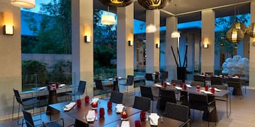 a restaurant with tables and chairs