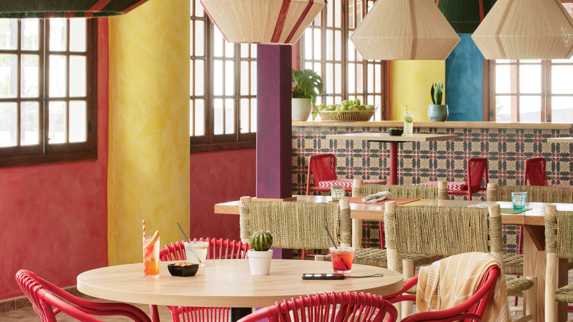 a room with tables and chairs