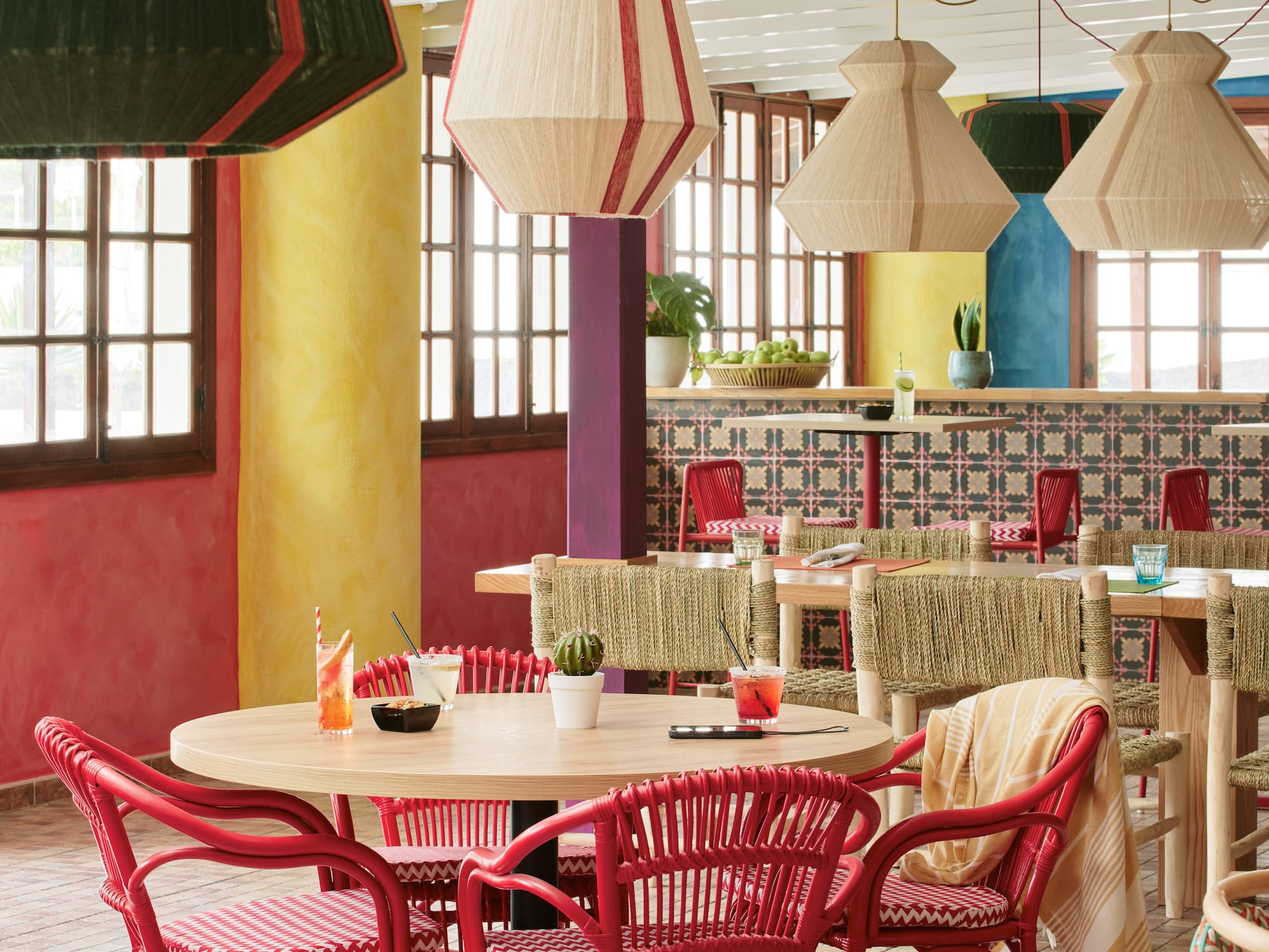 a room with tables and chairs