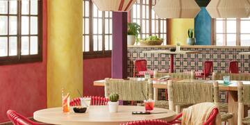 a room with tables and chairs