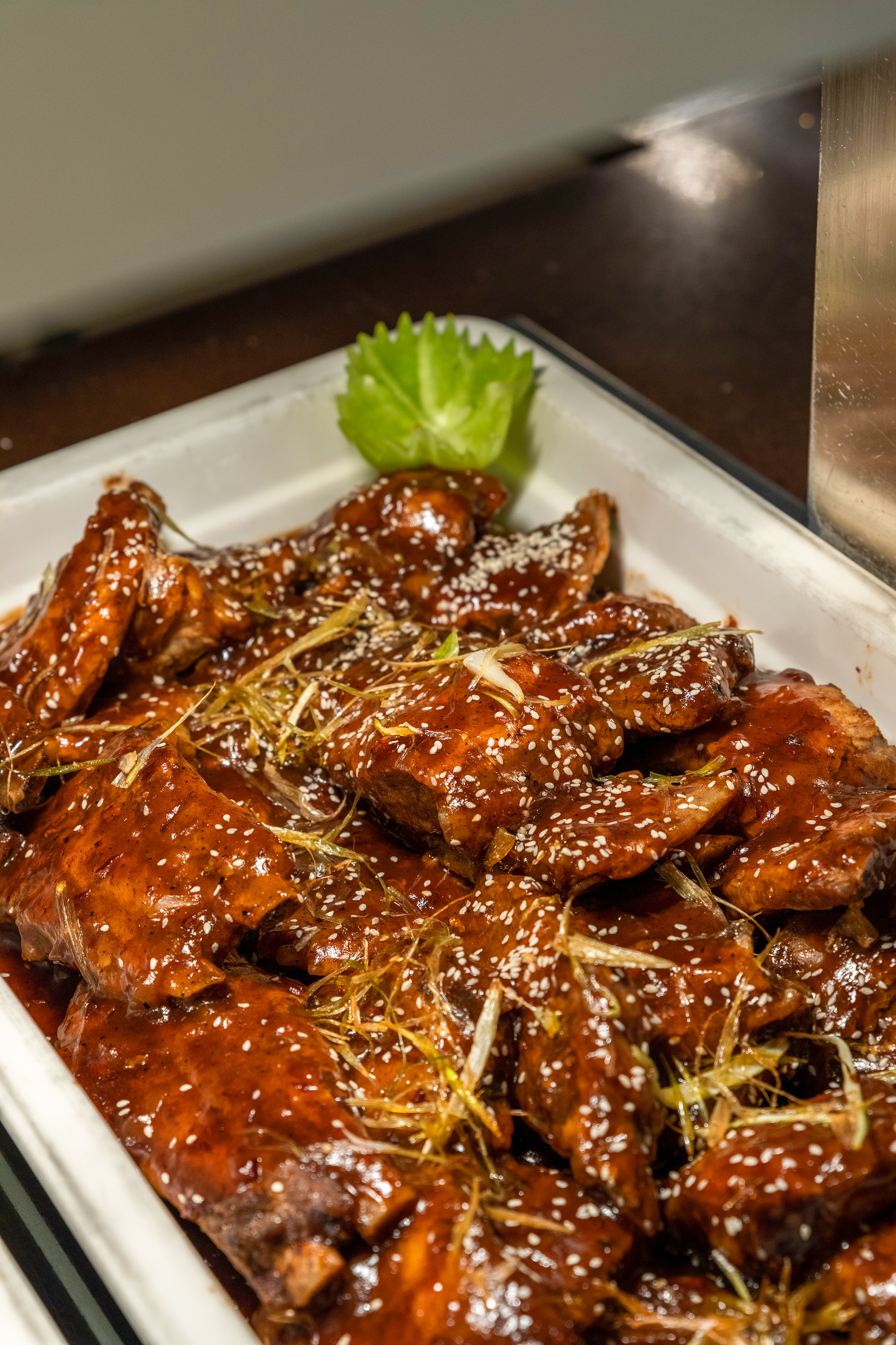 a plate of meat with sauce