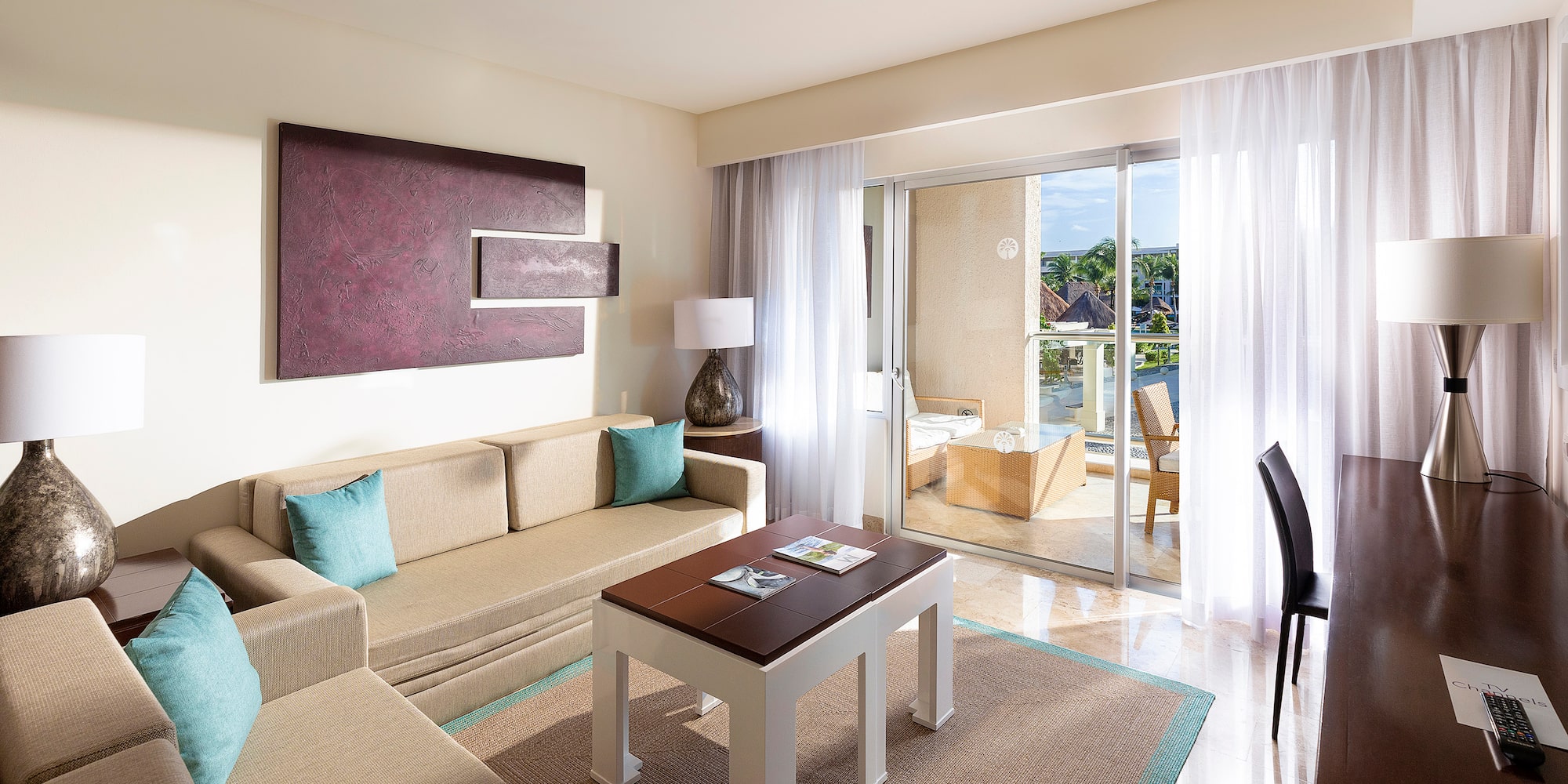 a living room with a couch and a table