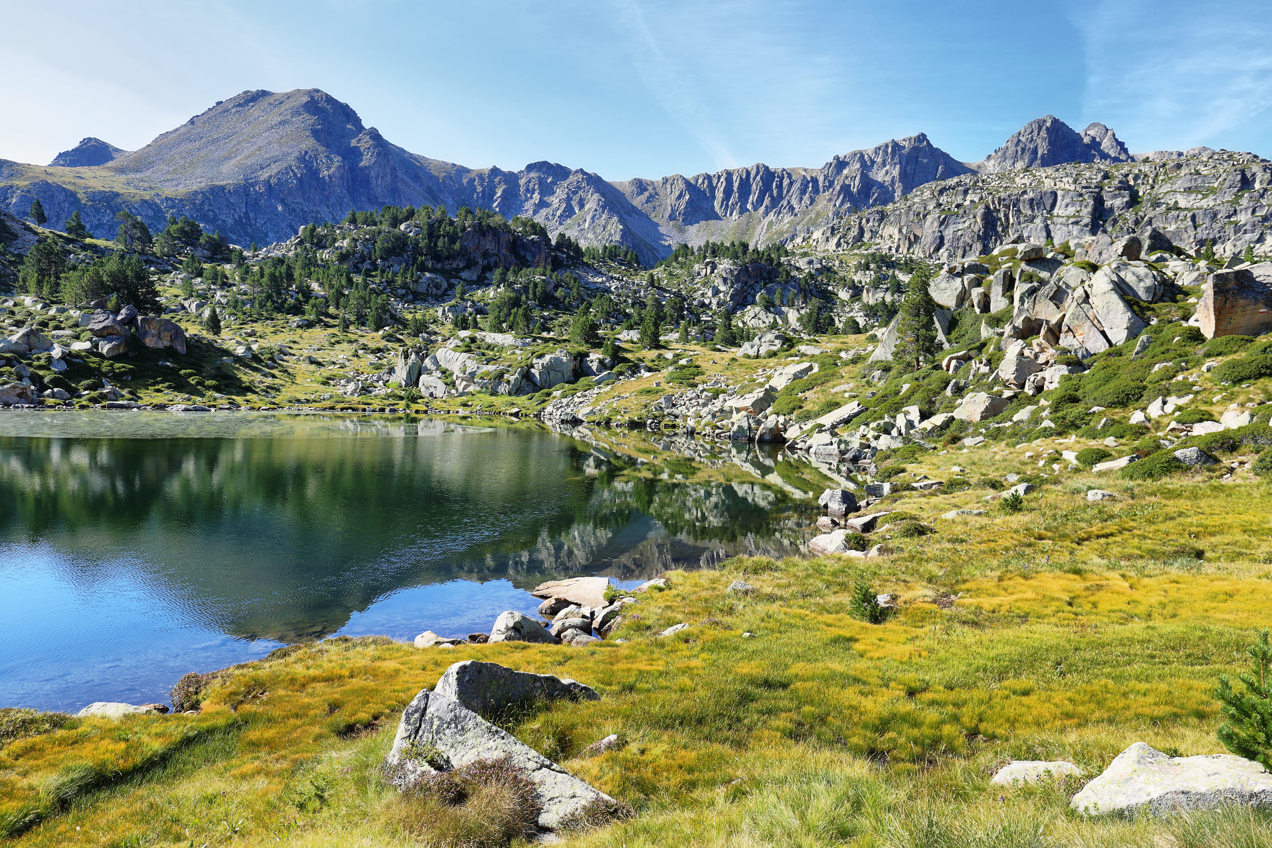 a lake surrounded by mountains