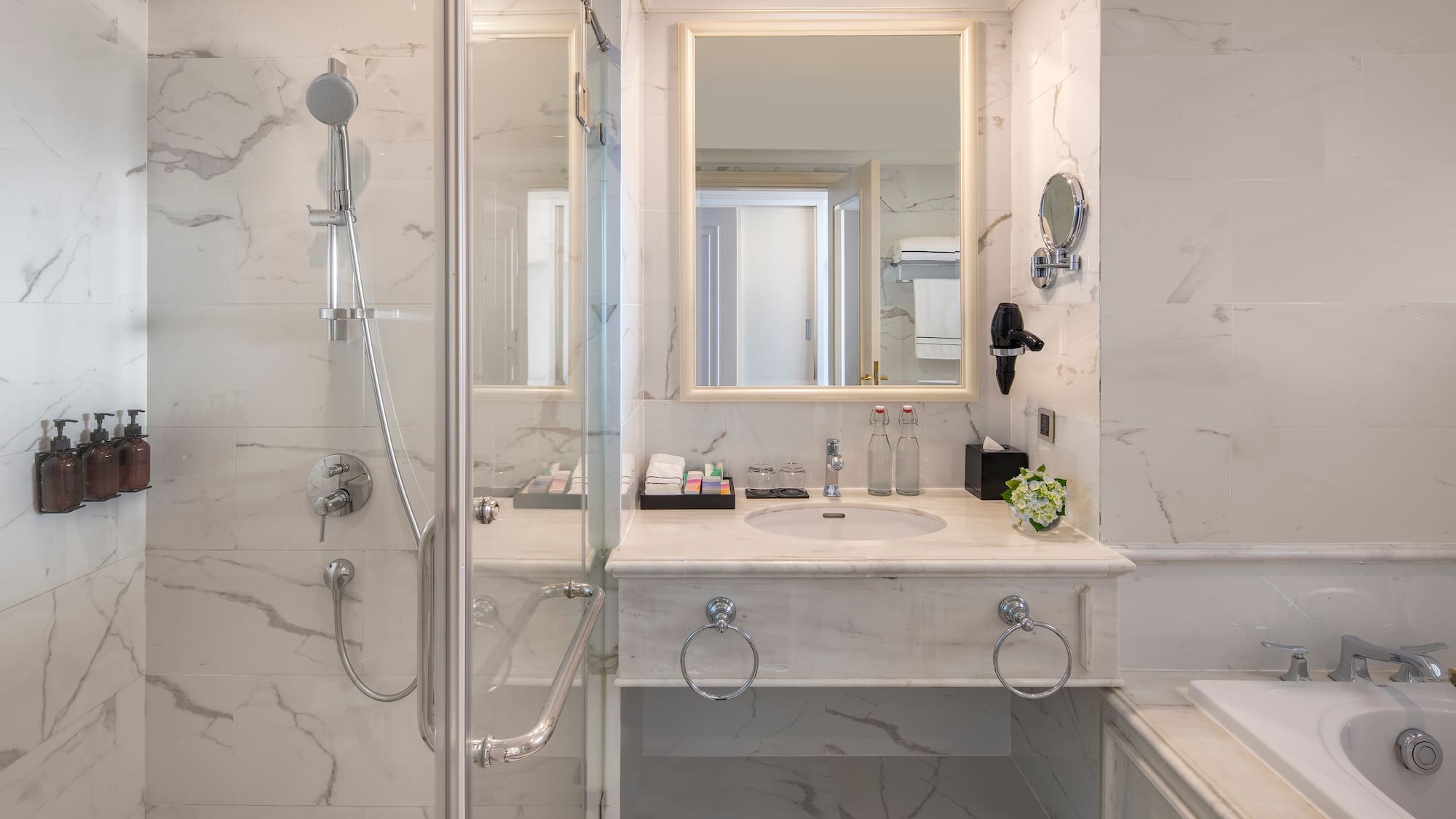 a bathroom with a shower and sink