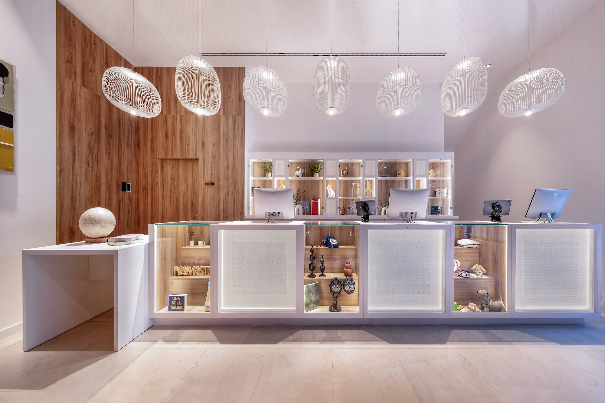 a reception desk with a counter and a desk with a desk and a desk with a desk and a desk with a desk and a desk with a desk and a desk with a desk and a desk