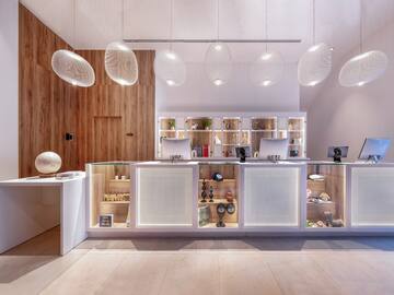 a reception desk with a counter and a desk with a desk and a desk with a desk and a desk with a desk and a desk with a desk and a desk with a desk and a desk