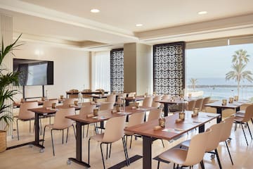 a room with tables and chairs