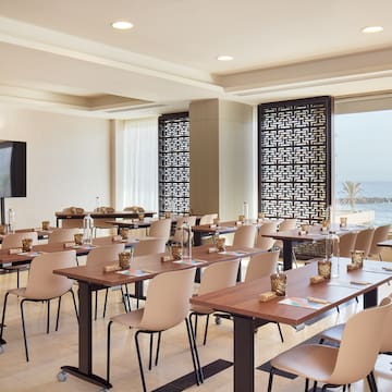 a room with tables and chairs