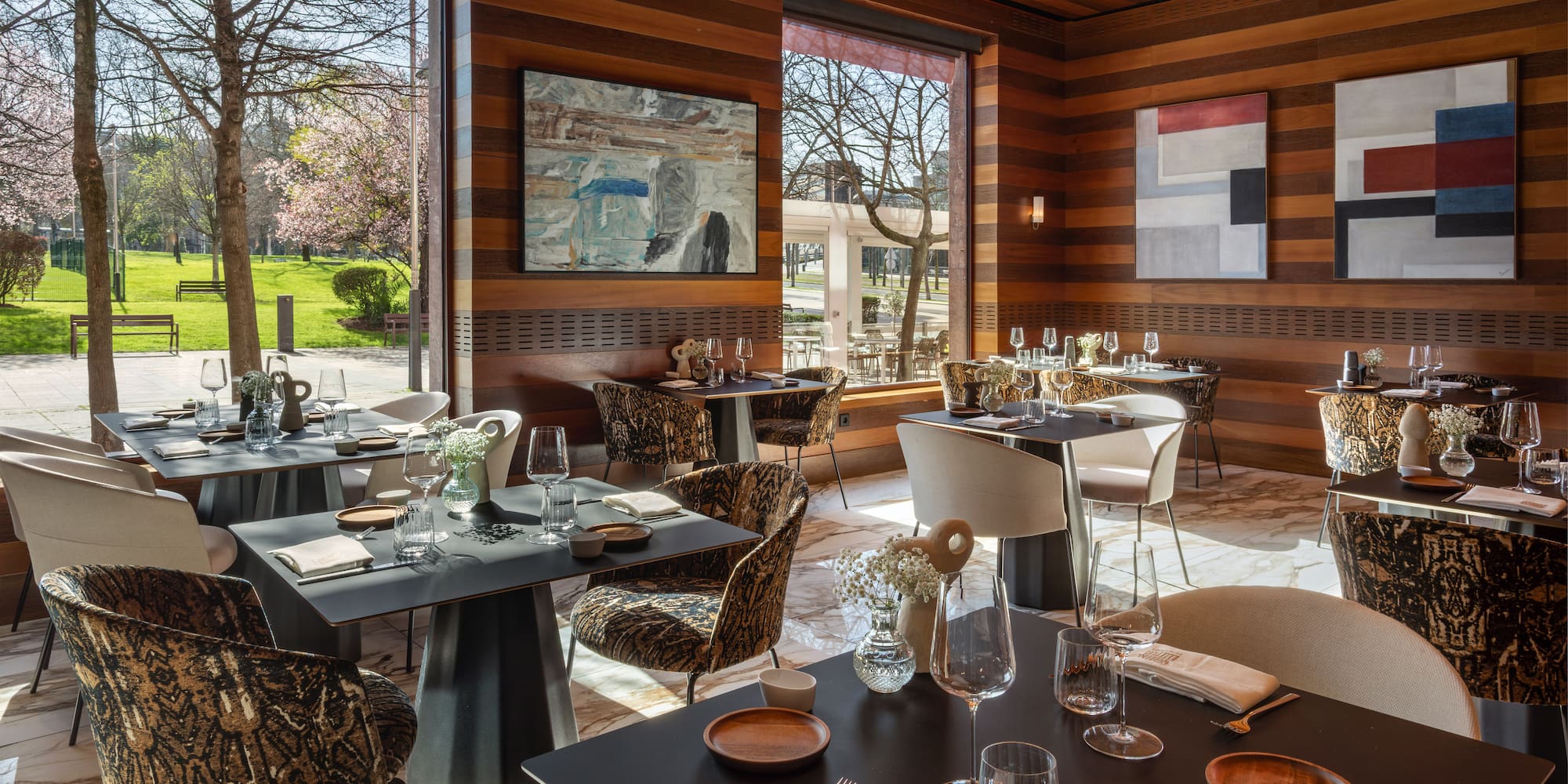a restaurant with tables and chairs