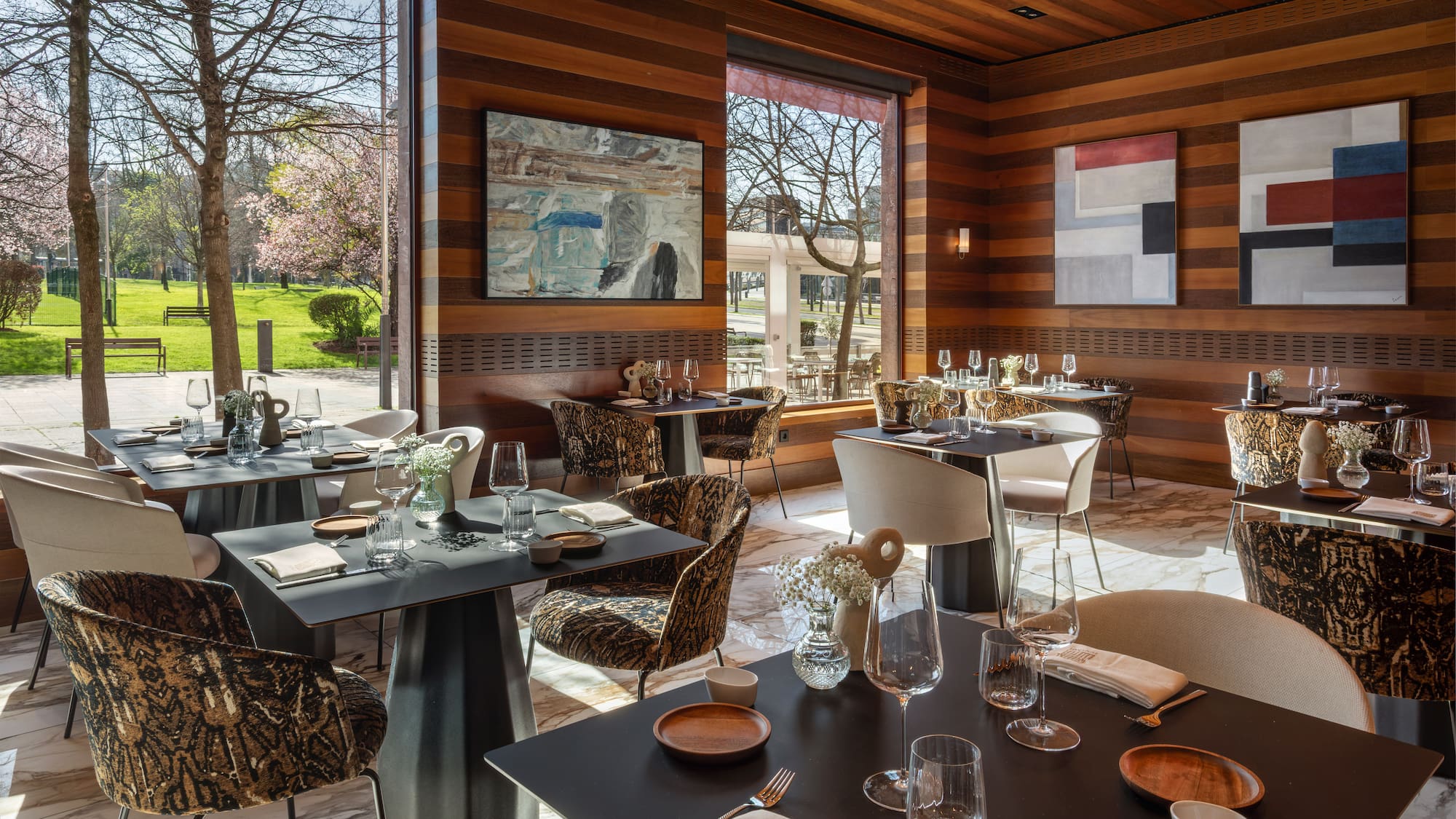 a restaurant with tables and chairs