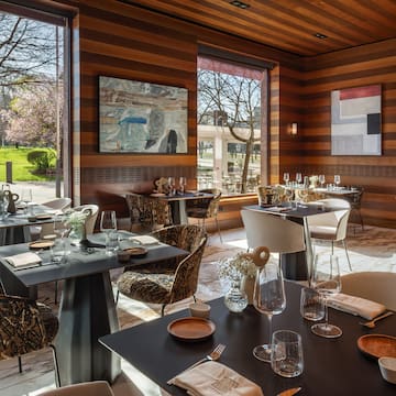 a restaurant with tables and chairs