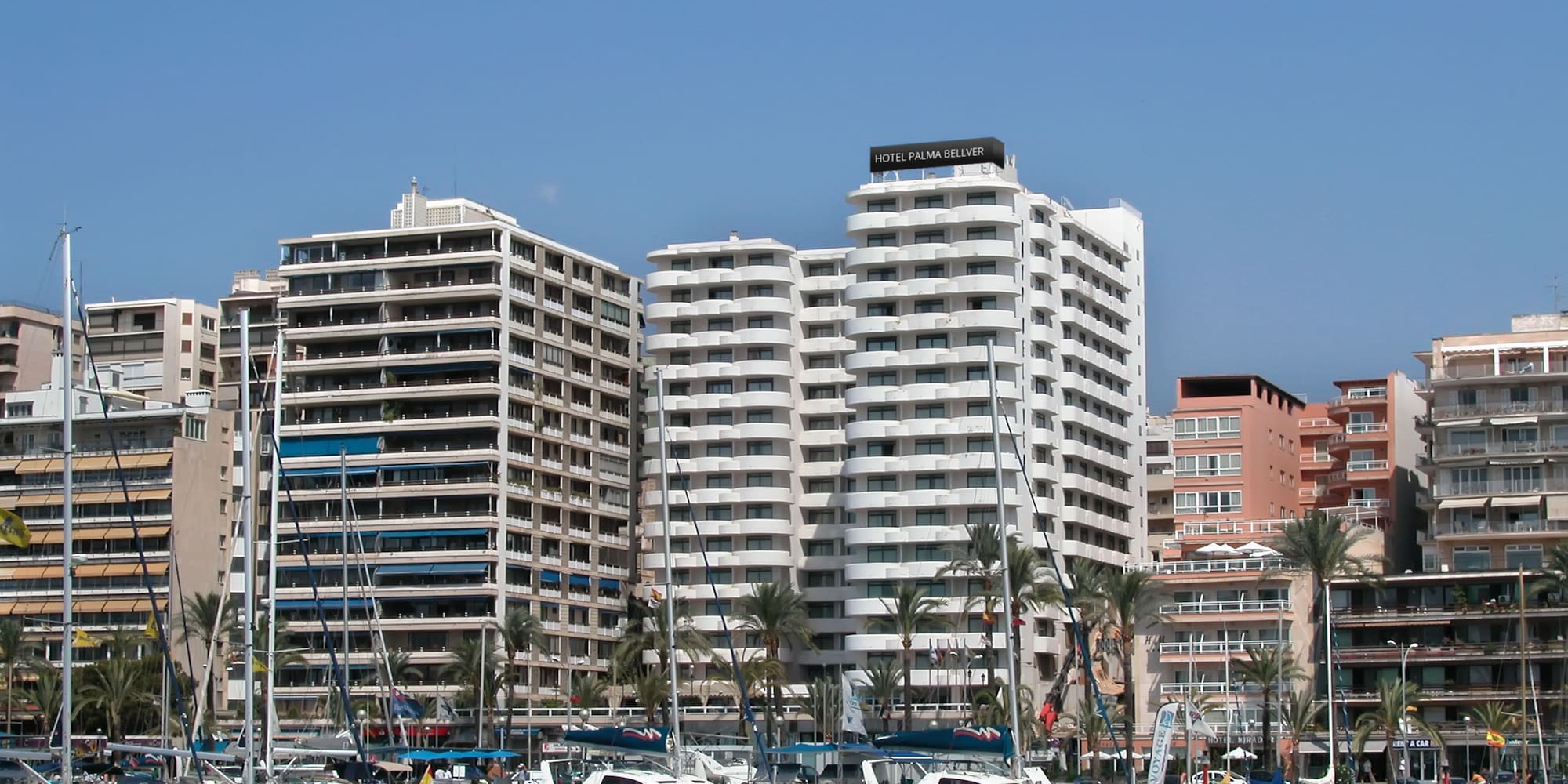 a group of boats in a harbor