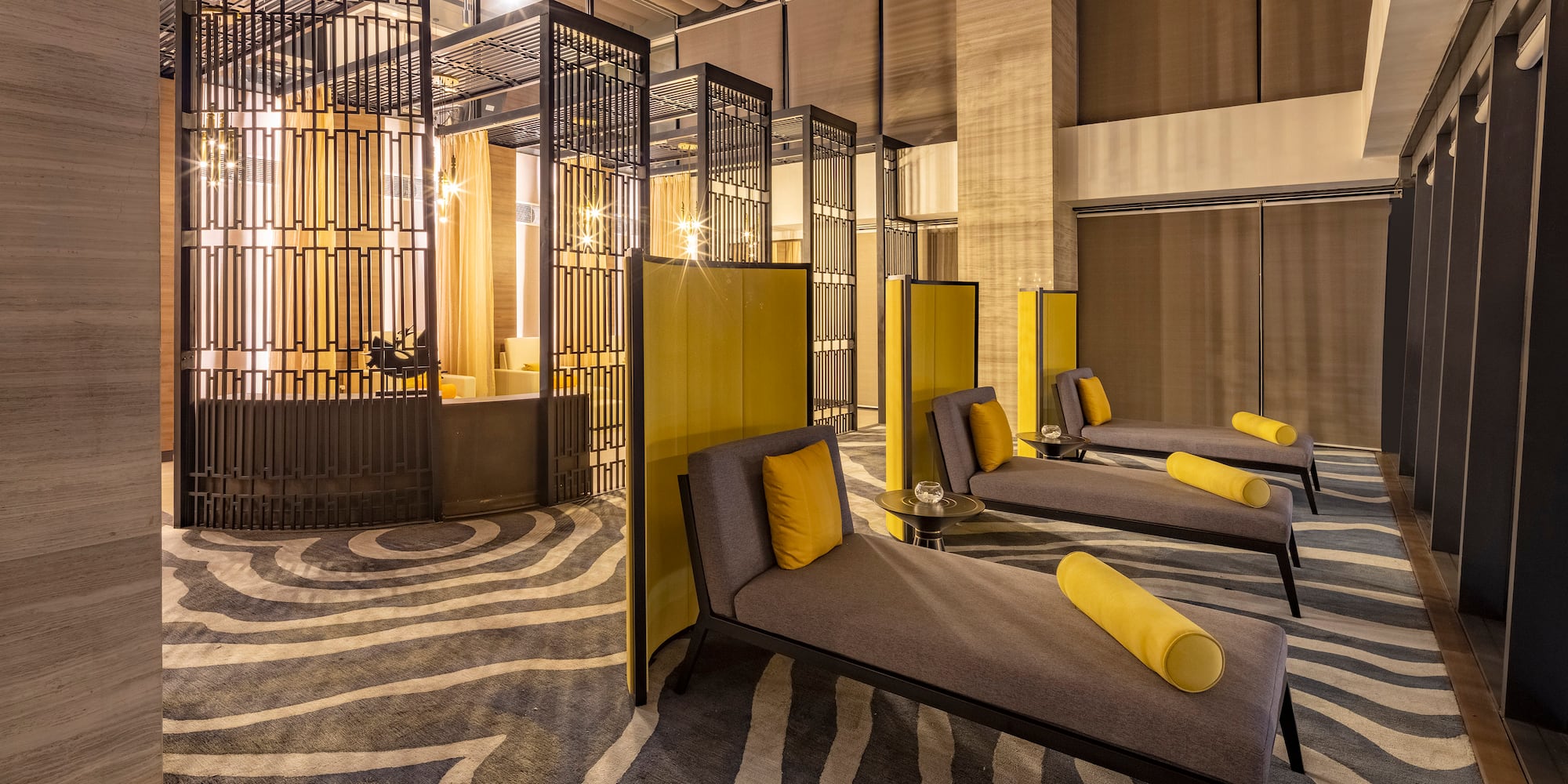 a room with chairs and screens