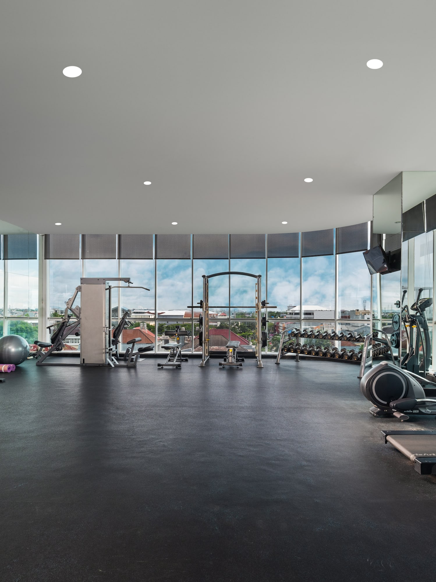 a large gym with exercise equipment