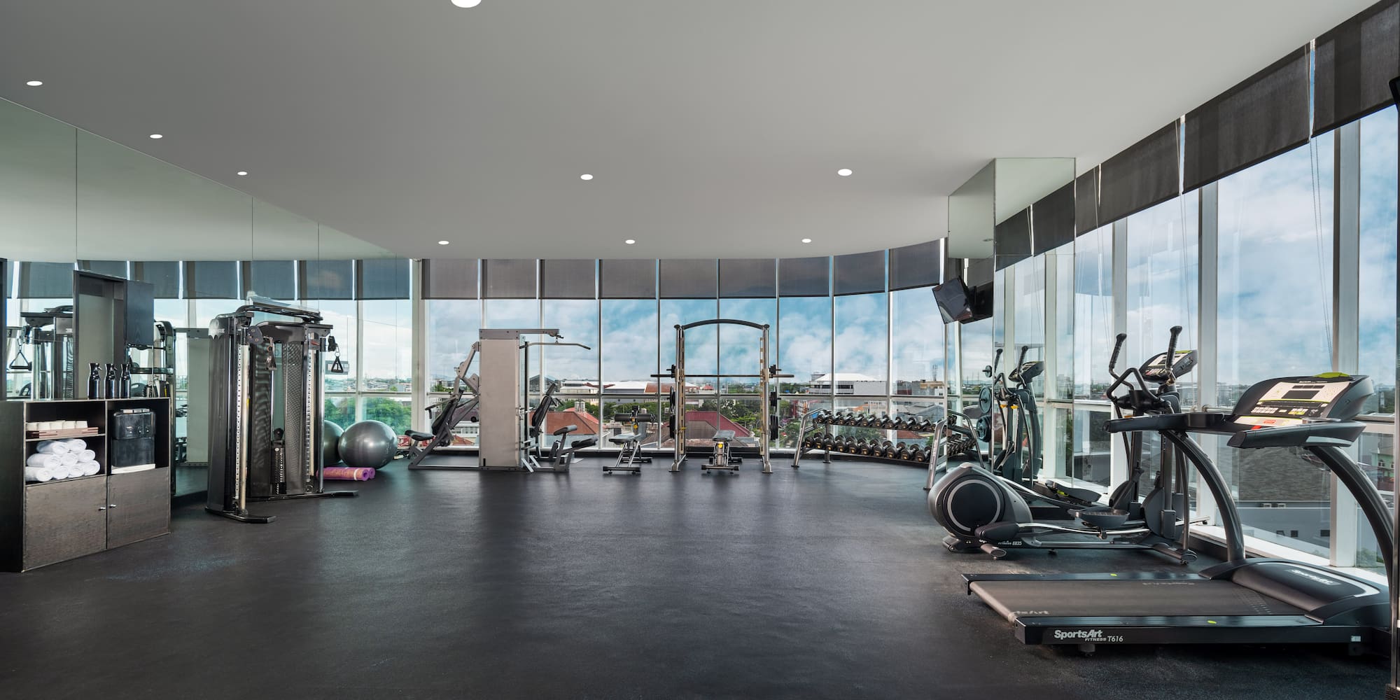 a large gym with exercise equipment