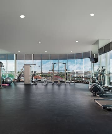 a large gym with exercise equipment