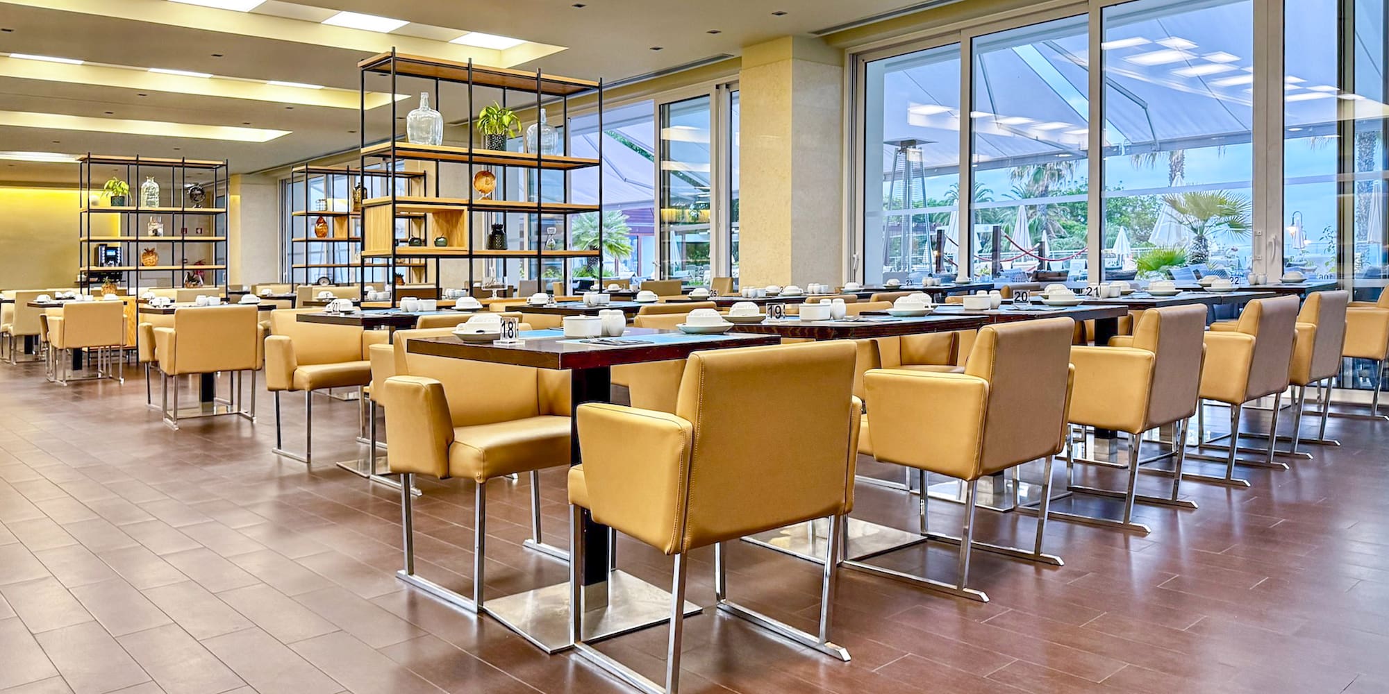 a room with tables and chairs