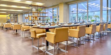 a room with tables and chairs