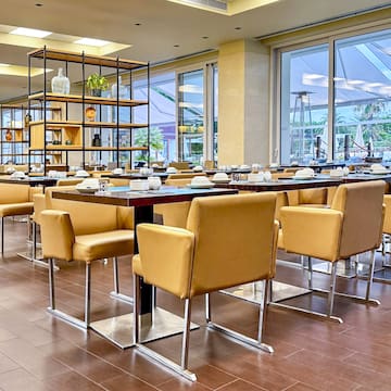 a room with tables and chairs