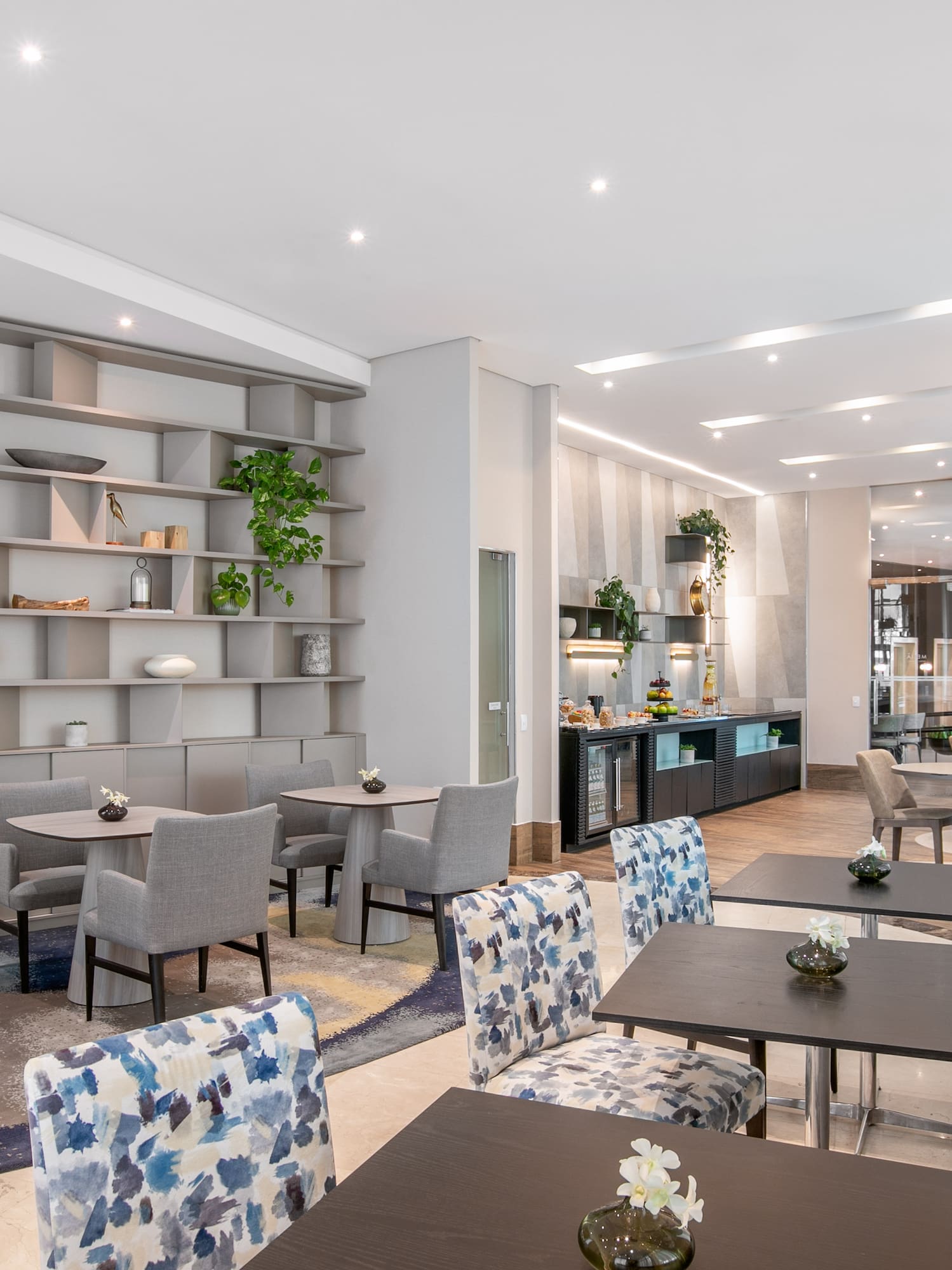 a room with tables and chairs