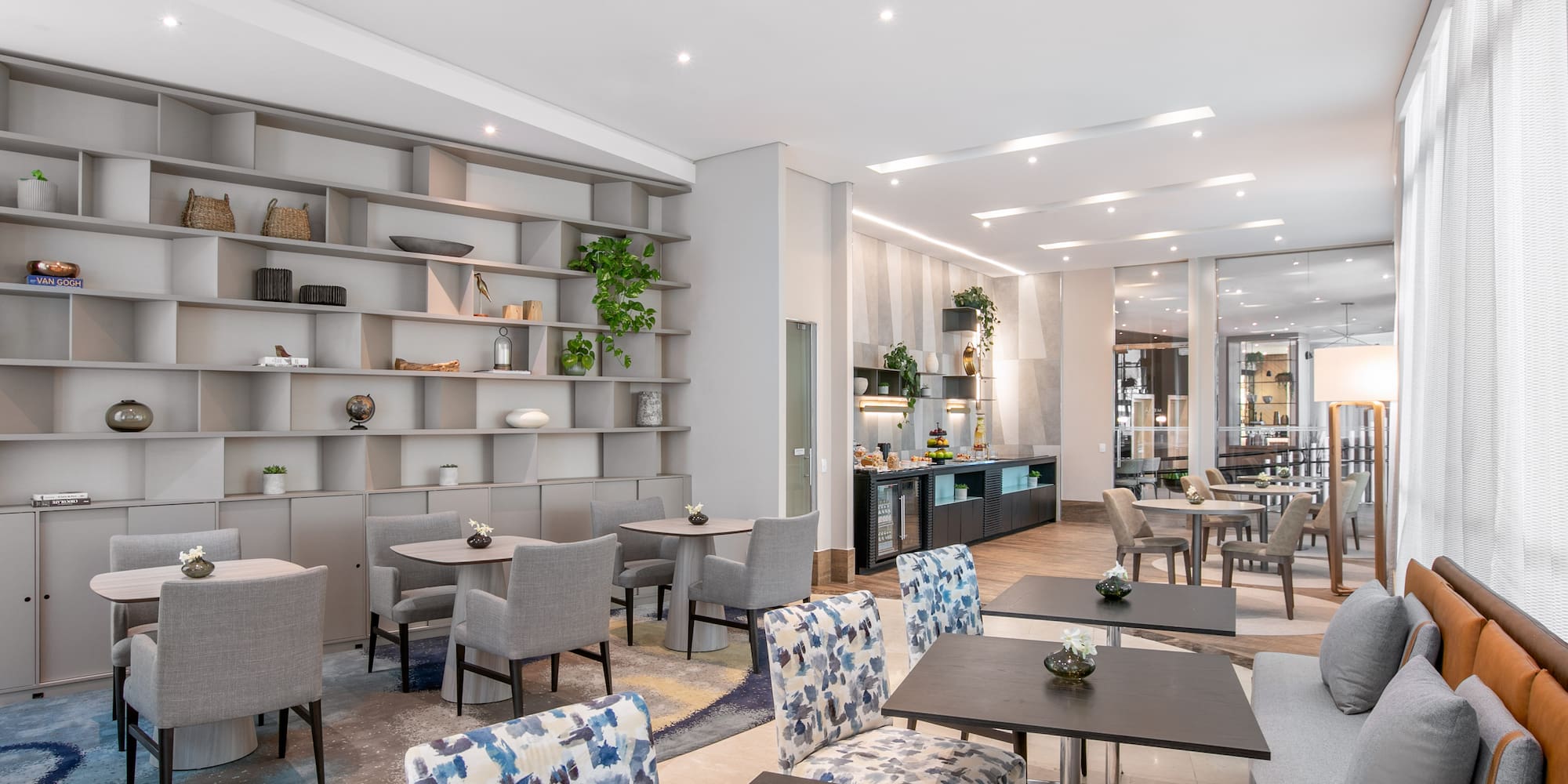 a room with a table and chairs