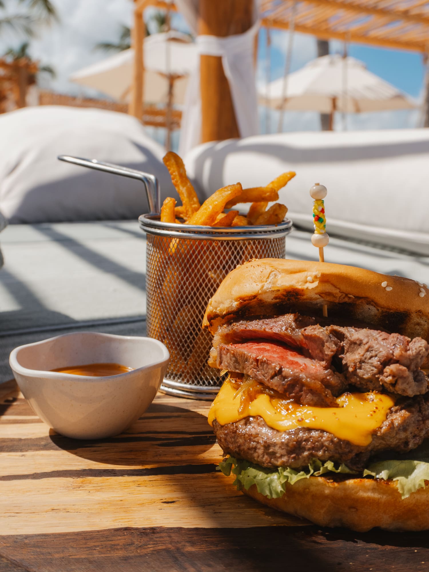 a burger and fries on a table