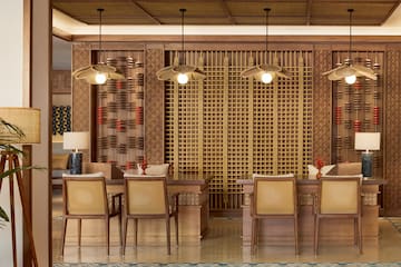 a room with a table and chairs