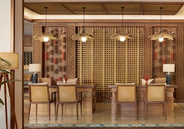 a room with a table and chairs