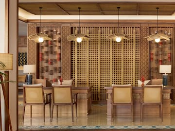 a room with a table and chairs