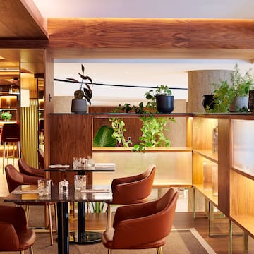 a room with a table and chairs