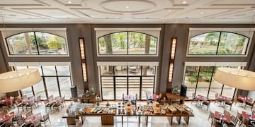 a room with tables and chairs