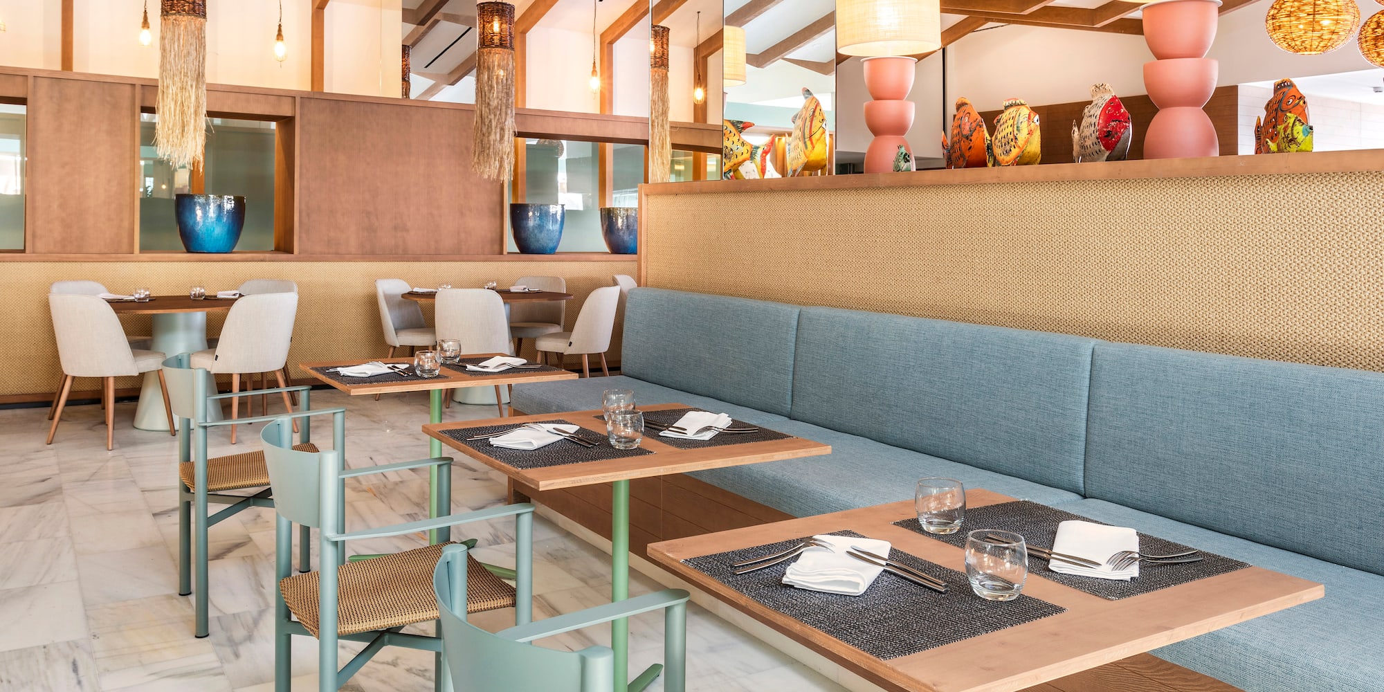 a restaurant with tables and chairs