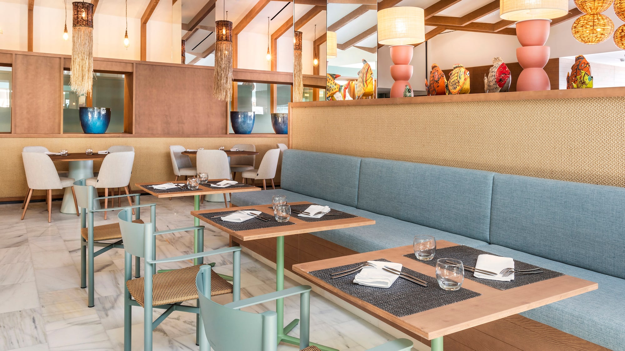 a restaurant with tables and chairs