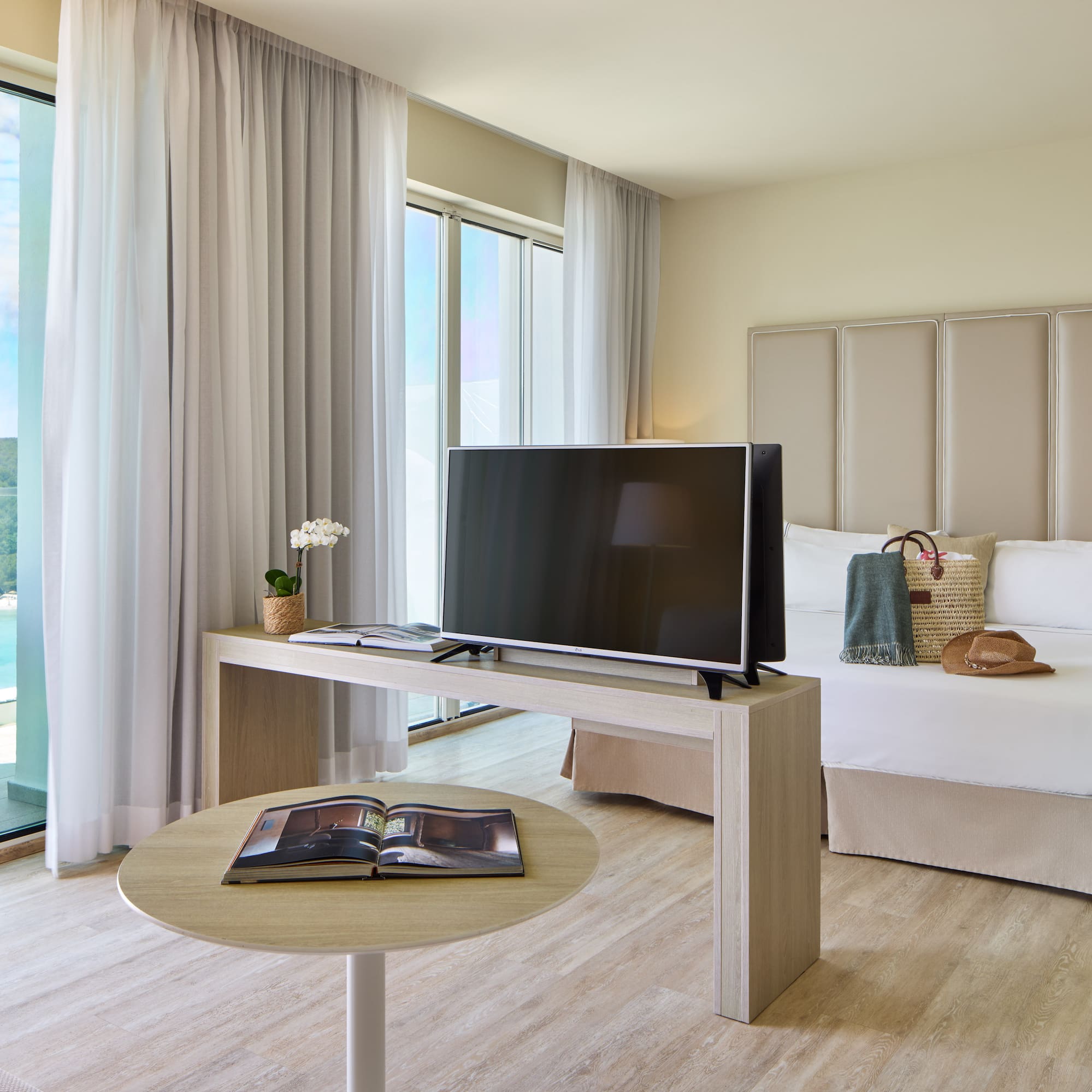 a room with a television and a table