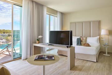 a room with a television and a table