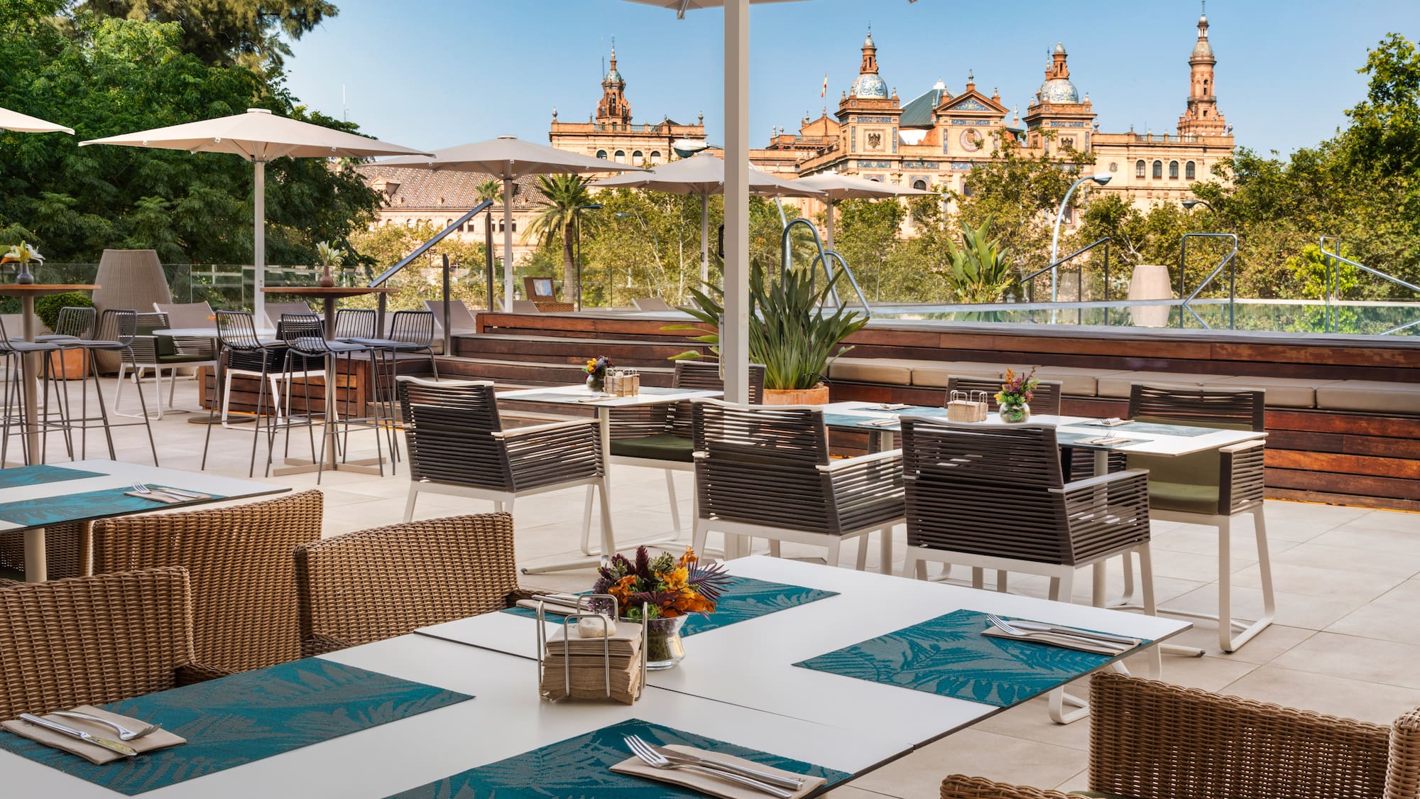 a patio with tables and chairs