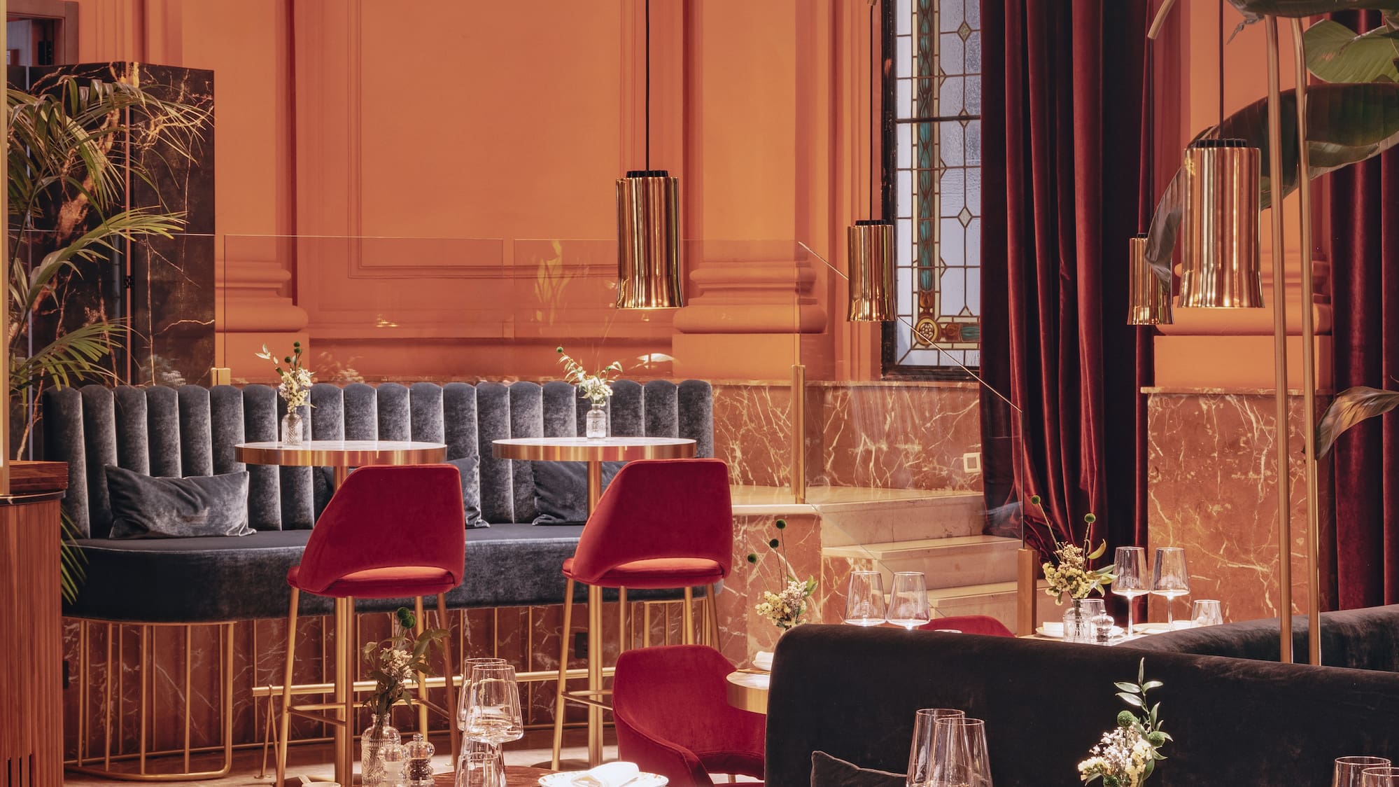 a restaurant with tables and chairs