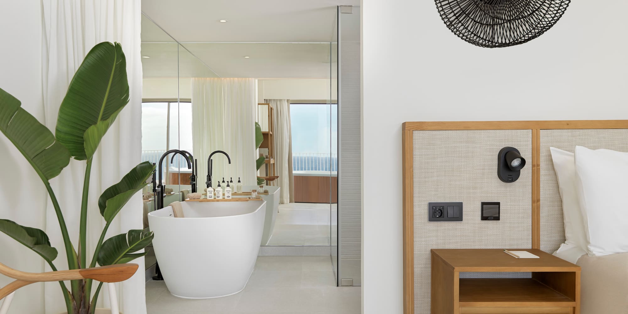 a bathroom with a tub and a sink