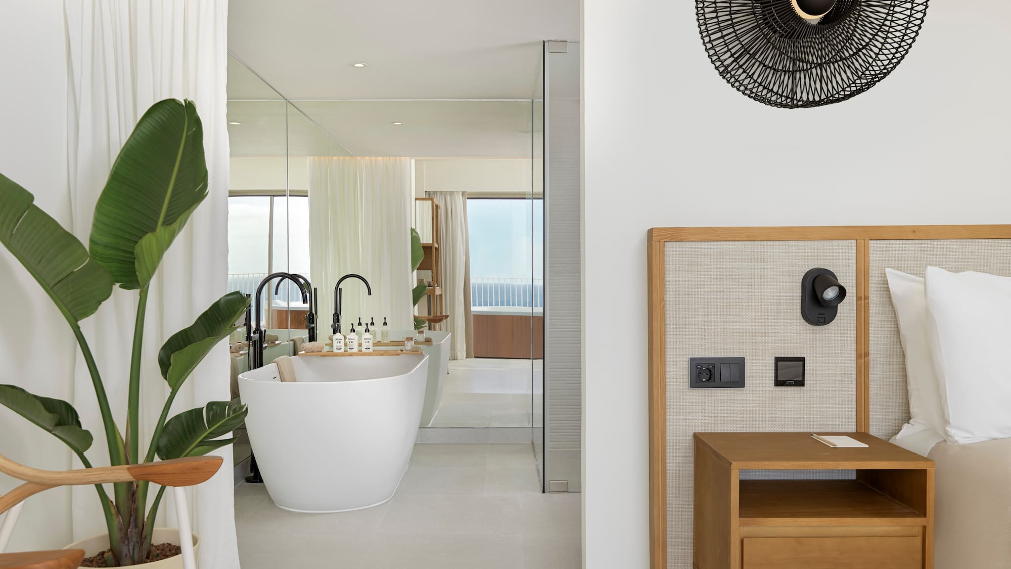 a bathroom with a tub and a sink