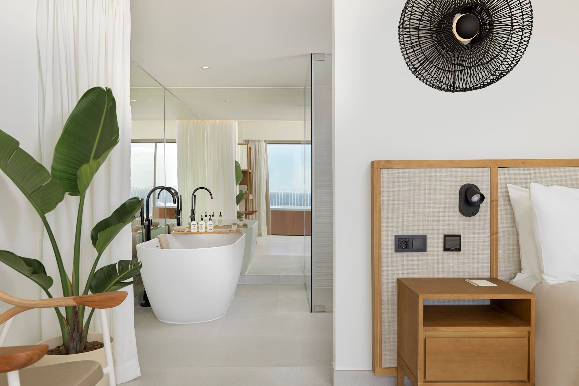 a bathroom with a tub and a sink